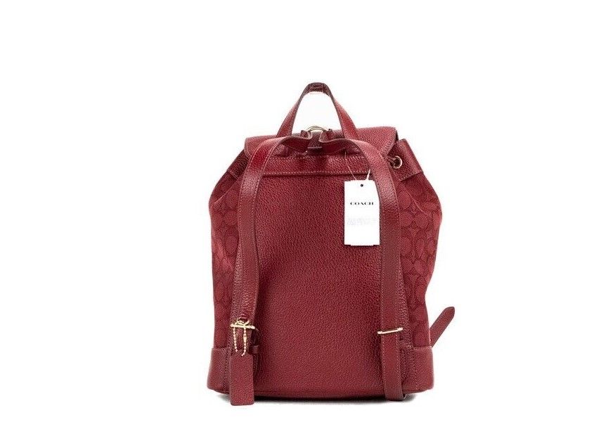 COACH Mochila Dempsey con parche del logo y lona jacquard exclusiva de Apple en rojo